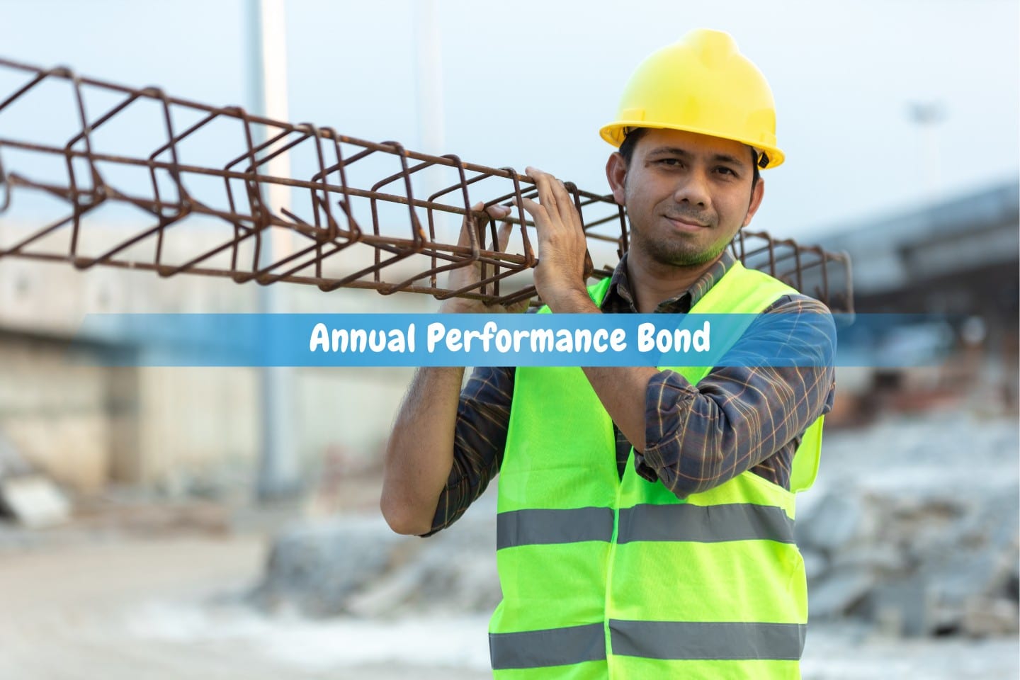 Annual Performance Bond - Asian construction worker on the construction site, carrying steel.