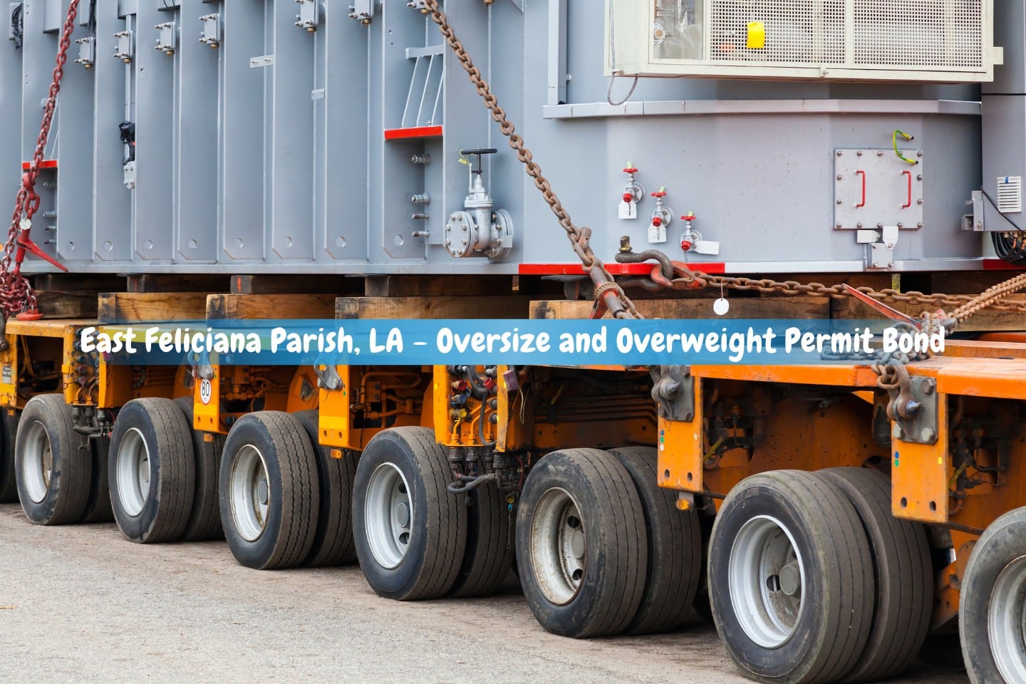 East Feliciana Parish, LA - Oversize and Overweight Permit Bond - Construction equipment and large, heavy goods are transported via road.