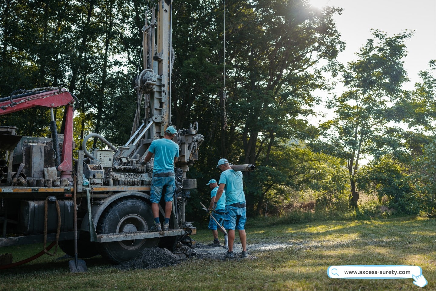 A water well drilling rig is getting ready to drill a hole in the ground.