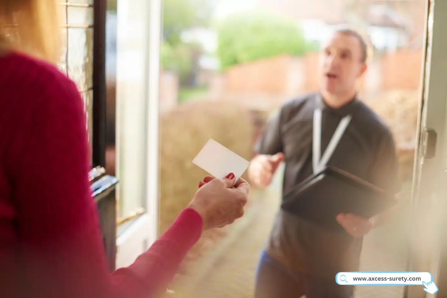 A salesman introduces himself to a homeowner when he calls.