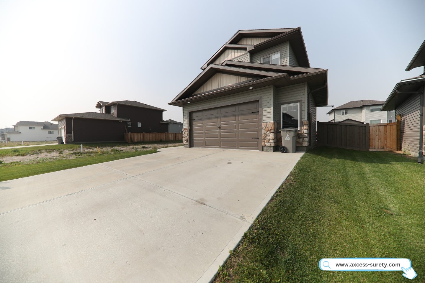 A spotless driveway in a residential neighborhood.