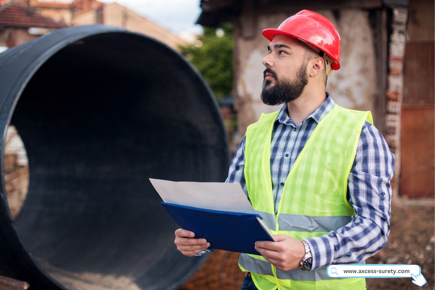 On a building site, a young construction worker.