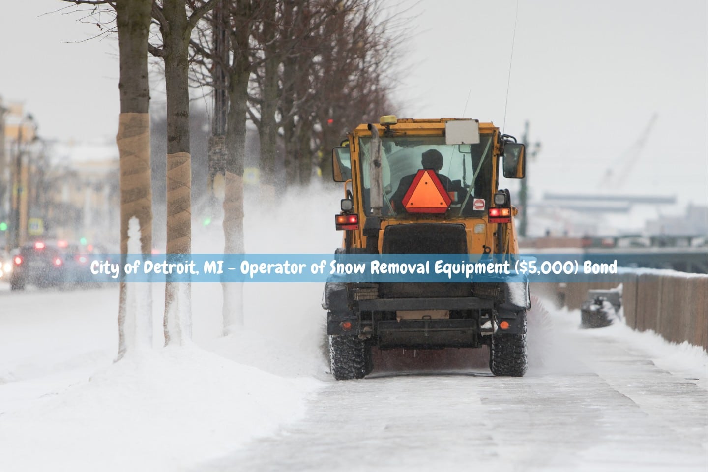 City of Detroit, MI - Operator of Snow Removal Equipment ($5,000) Bond - A snow plow is in operation to clear the road of snow.