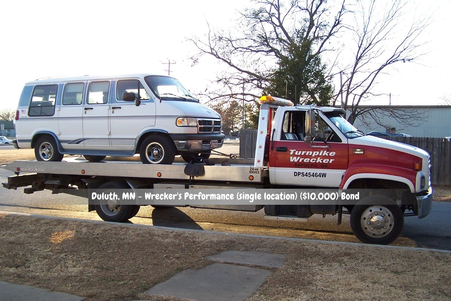 Duluth, MN - Wrecker's Performance (single location) ($10,000) Bond - A turnpike wrecker carrying an old van.