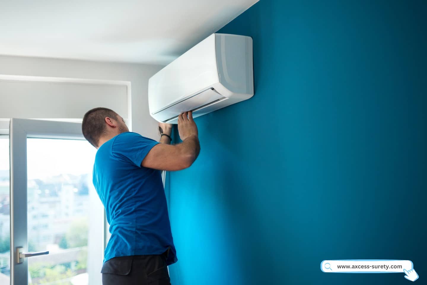 A qualified specialist installs an interior unit for a split AC system.