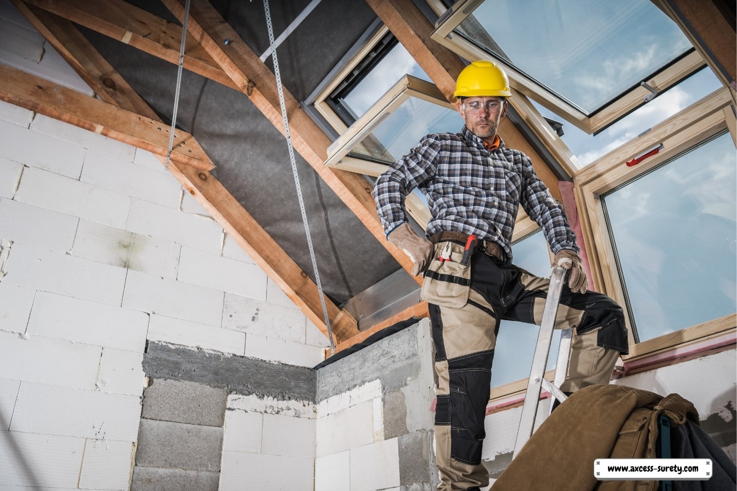 installing windows on the roof of a freshly constructed home.