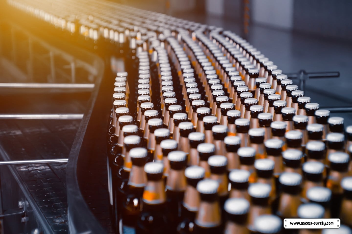 On a conveyor line are bottles of beer. industrial manufacturing of beer.