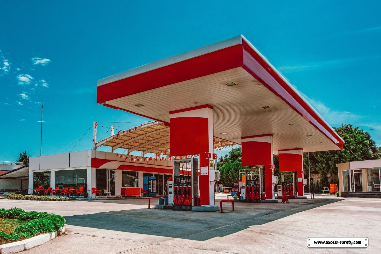 A typical gas station with a red concept.