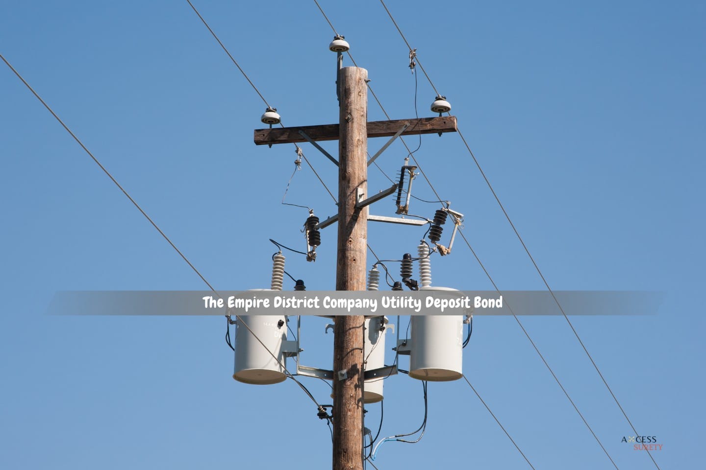 The Empire District Company Utility Deposit Bond - Blue sky and a wooden power utility pole.
