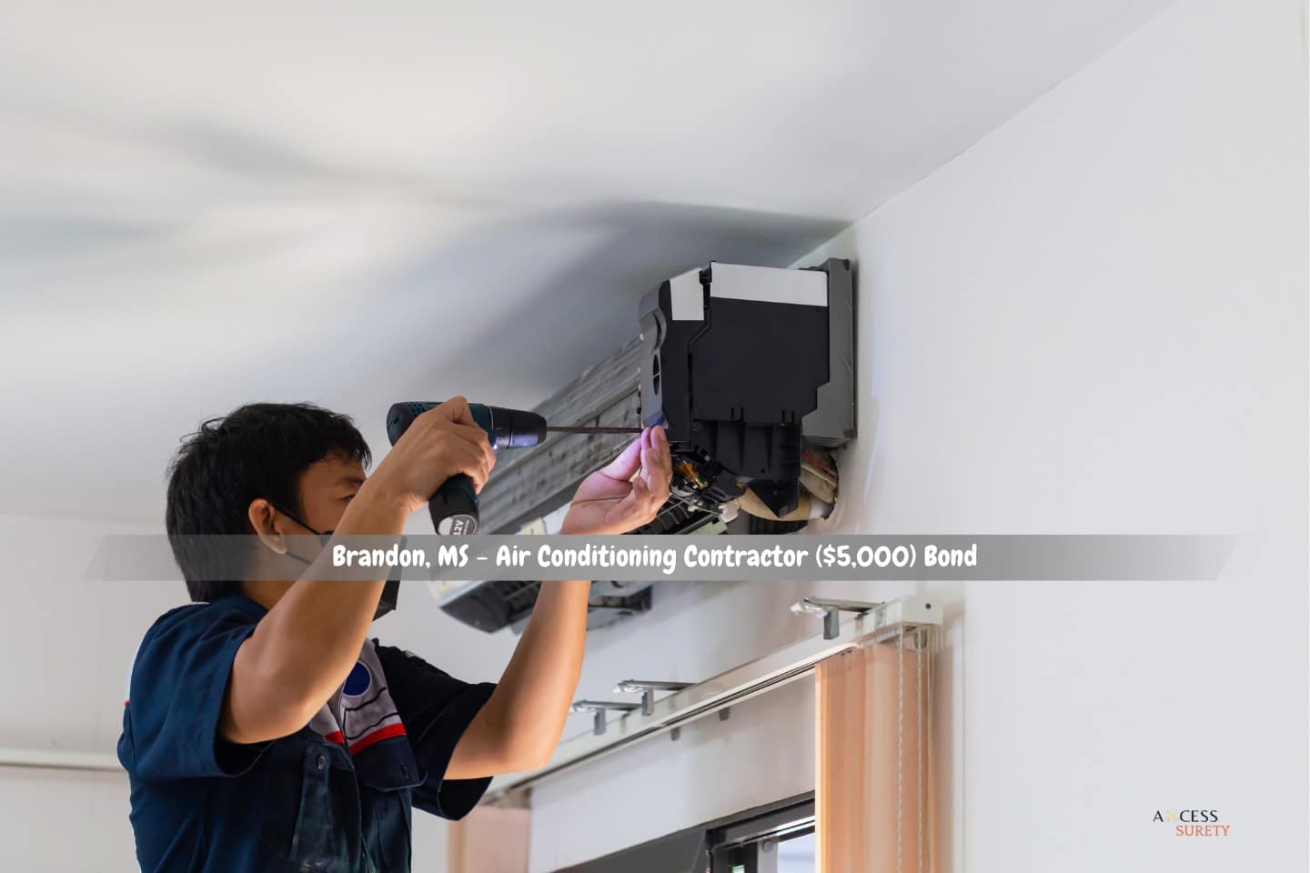 Brandon, MS - Air Conditioning Contractor ($5,000) Bond - The repairman is repairing the air conditioning system.