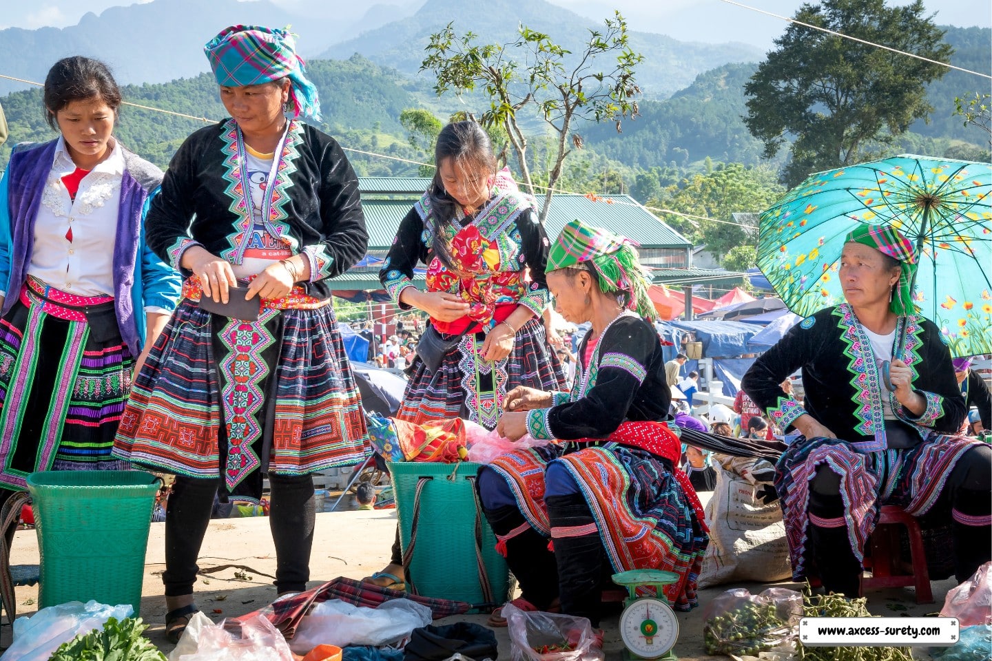Asian sellers at the local market dressed traditionally.