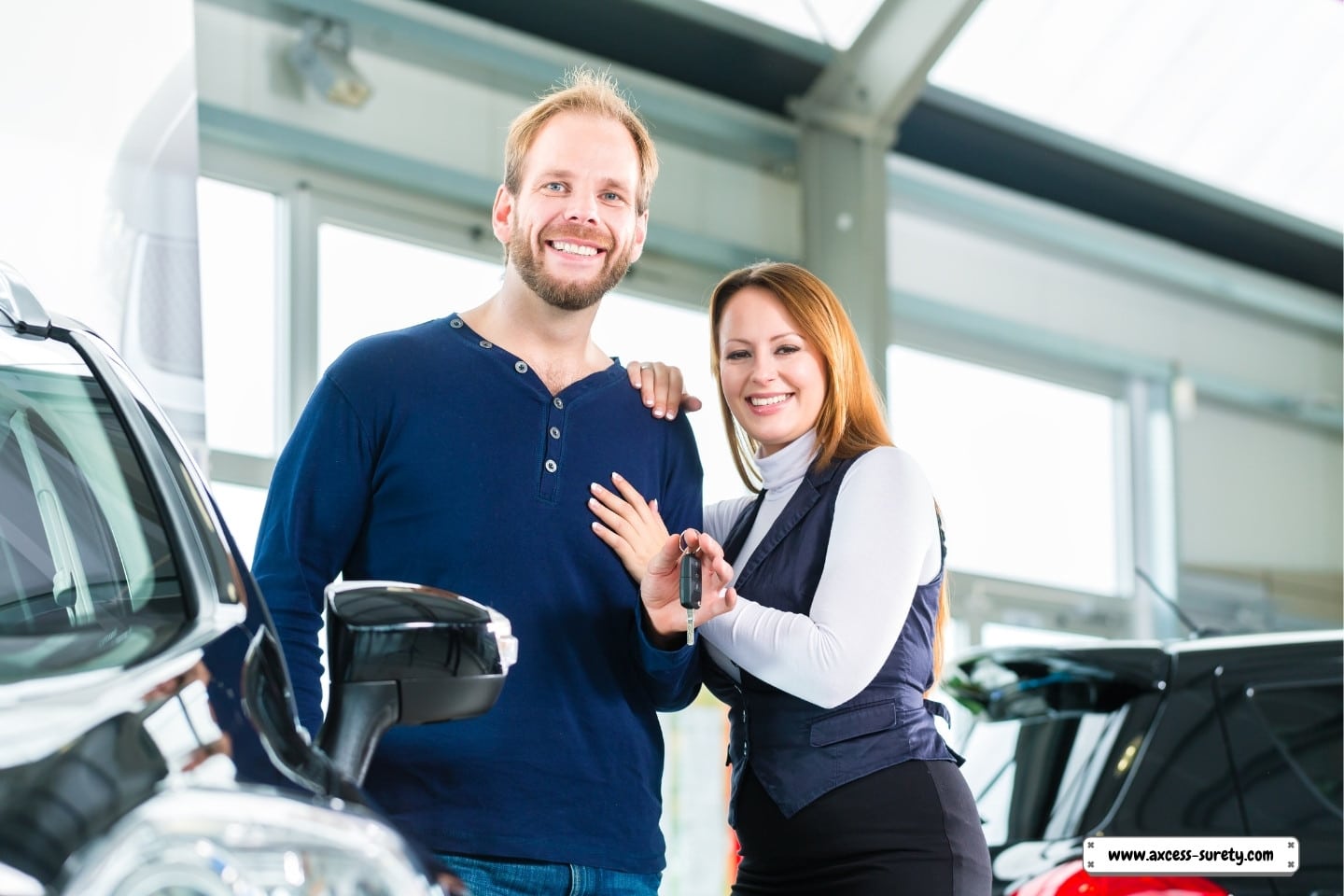A young couple or consumers who purchased a car from a dealership.