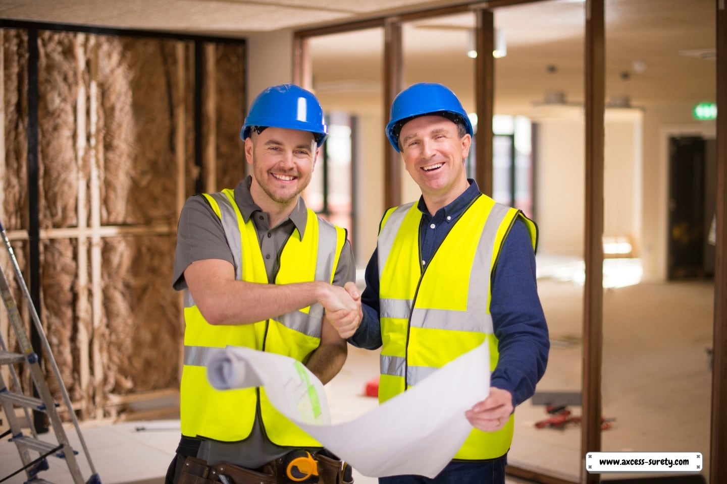 Contractors clutching blueprints inside the built-out house with trembling hands.