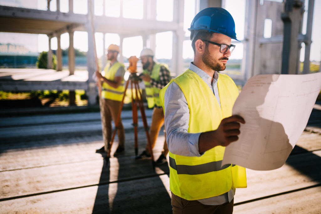 Picture of male construction engineer working on building site