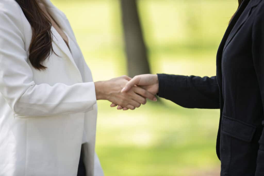 business-team-touching-hands-together-after-comple-2023-11-27-05-28-12-utc