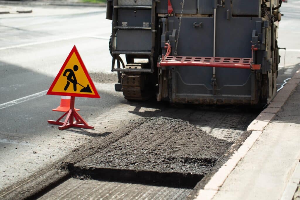 asphalt-repair-fraser-and-road-sign-2024-08-08-08-02-52-utc_11zon