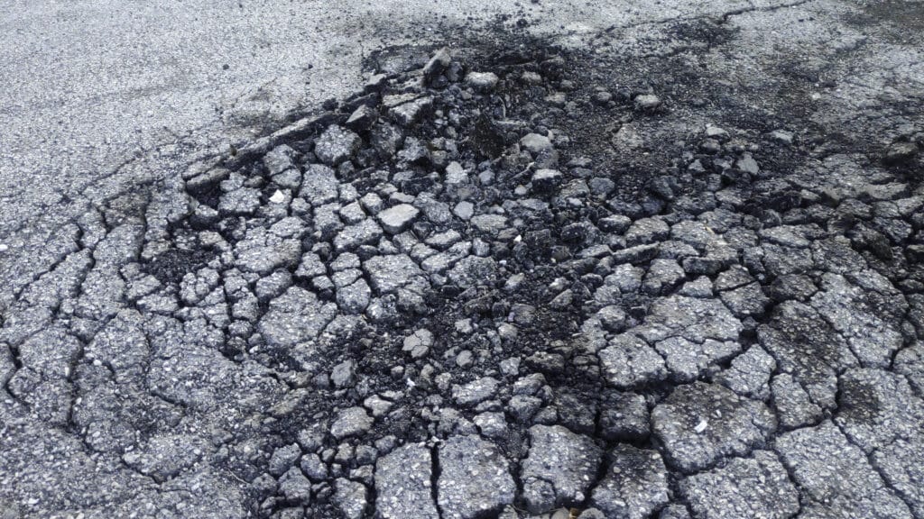 asphalt-road-with-crack-damage-and-broken-2023-11-27-05-14-37-utc