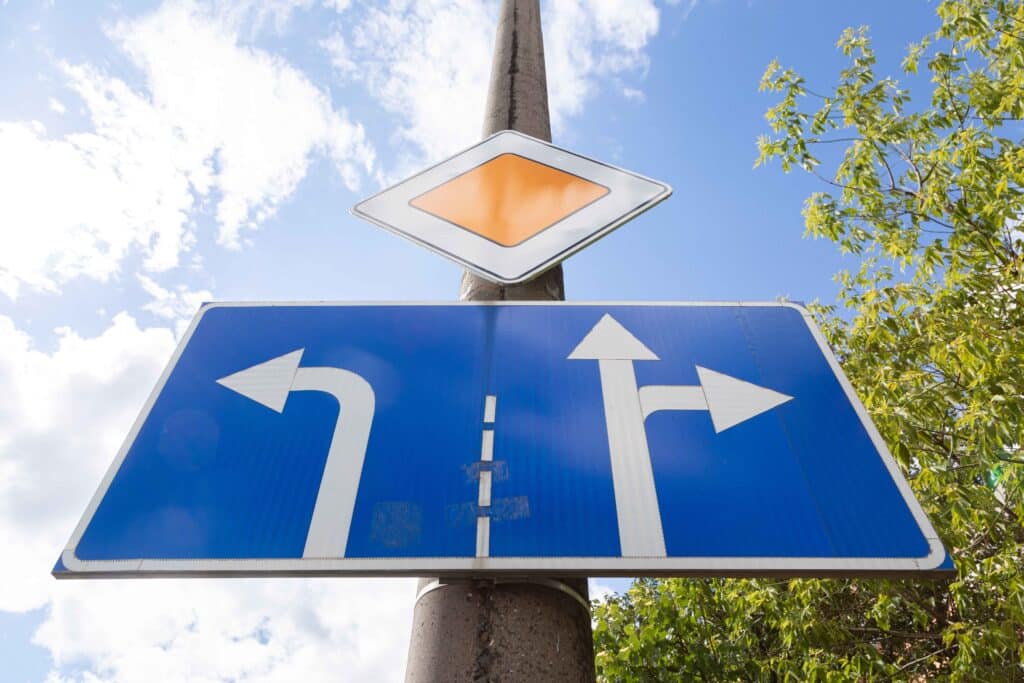 bottom-view-of-roadsign-main-road-with-tablet-with-2023-11-27-05-16-47-utc_11zon