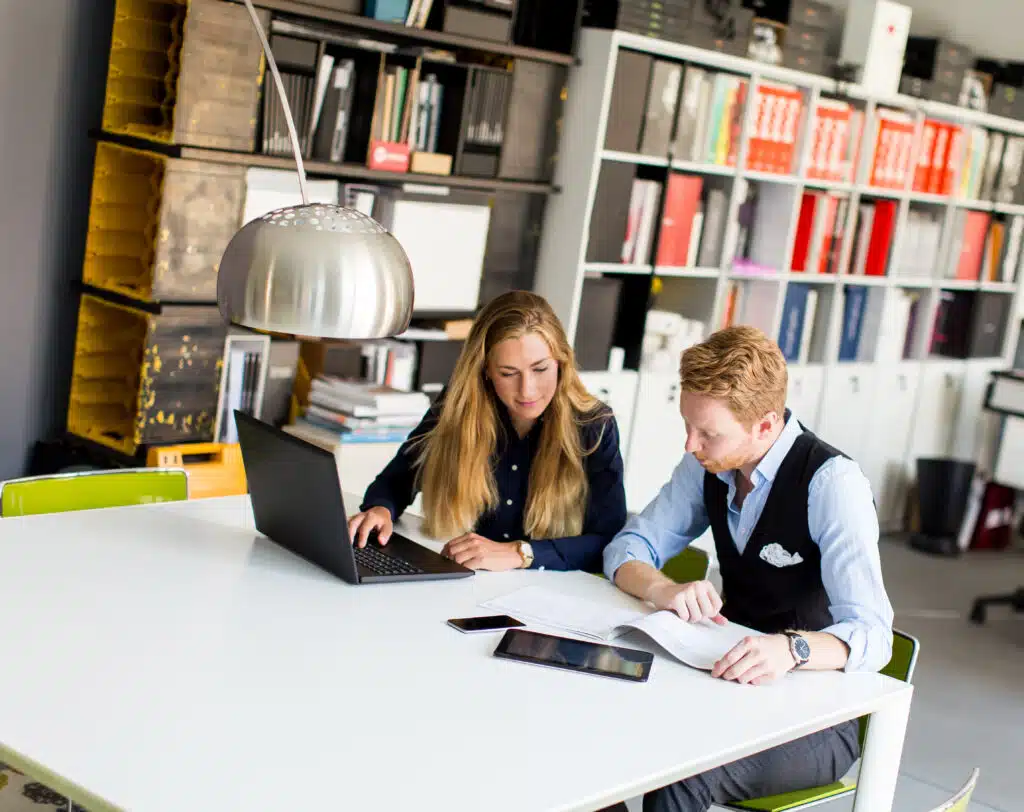 Young business people are in the office and working together