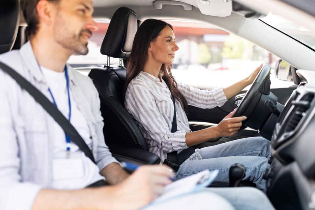 confident-young-lady-passing-exams-at-driving-scho-2023-11-27-05-03-14-utc