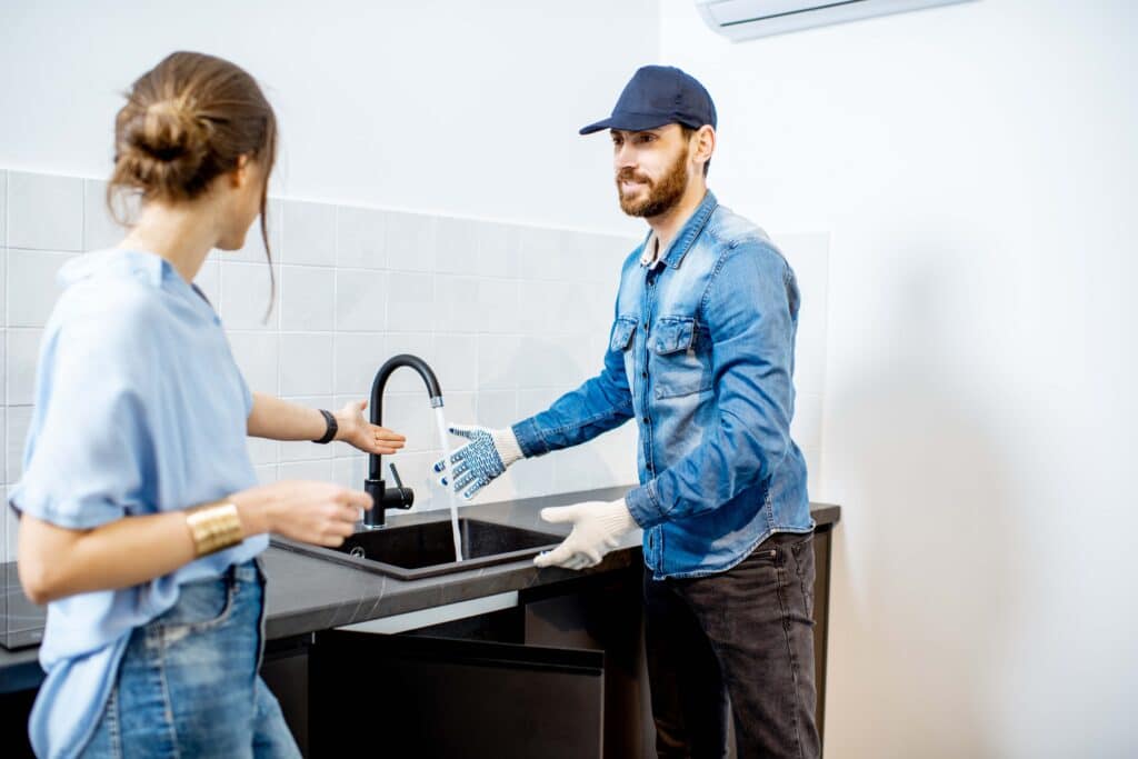 handy-man-with-woman-on-the-kitchen-2023-11-27-05-19-22-utc_11zon