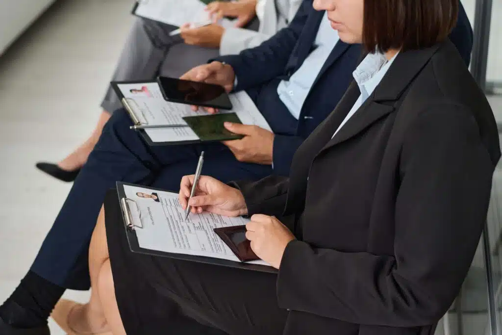 people-filling-documents-to-get-visa-2023-11-27-05-35-50-utc_11zon