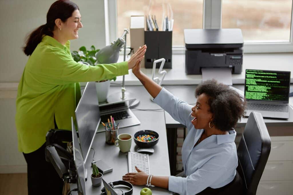 plus-size-software-engineer-colleagues-rejoicing-a-2024-07-23-23-55-48-utc_11zon