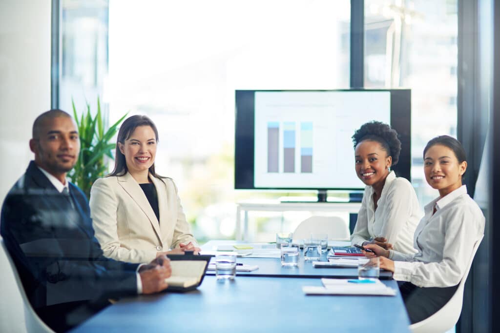 Portrait of a group of businesspeople having a boardroom meeting together.