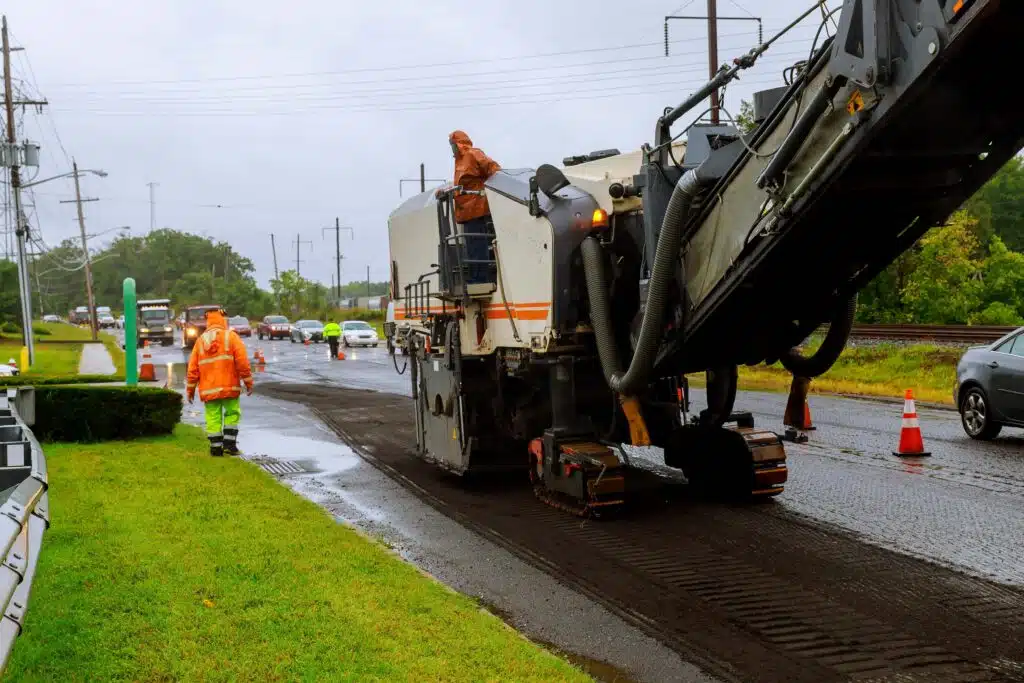 road-works-asphalt-removing-machine-loading-powder-2023-11-27-05-04-43-utc_11zon