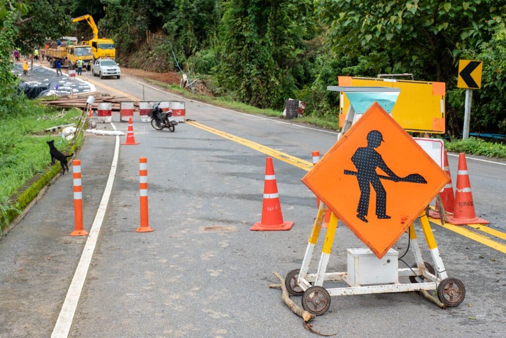 traffic-signs-on-highway-with-landslide-collapsed-2024-08-22-22-33-06-utc_11zon