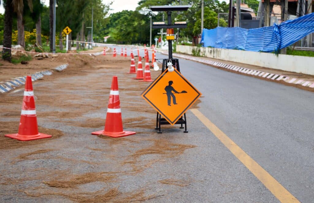 under-construction-sign-on-the-asphalt-road-2023-11-27-04-57-15-utc_11zon
