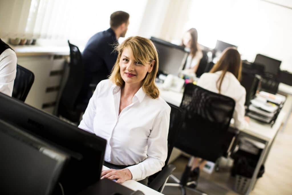 Young businesspeople in modern office
