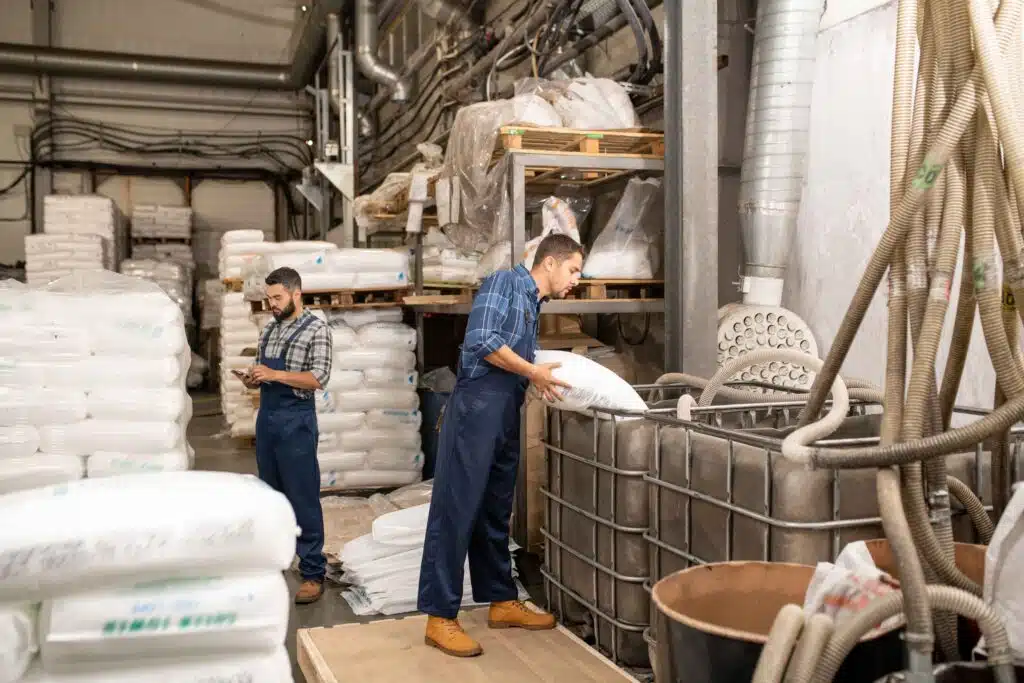 young-workers-of-large-factory-scattering-polymer-2023-11-27-05-25-22-utc_11zon
