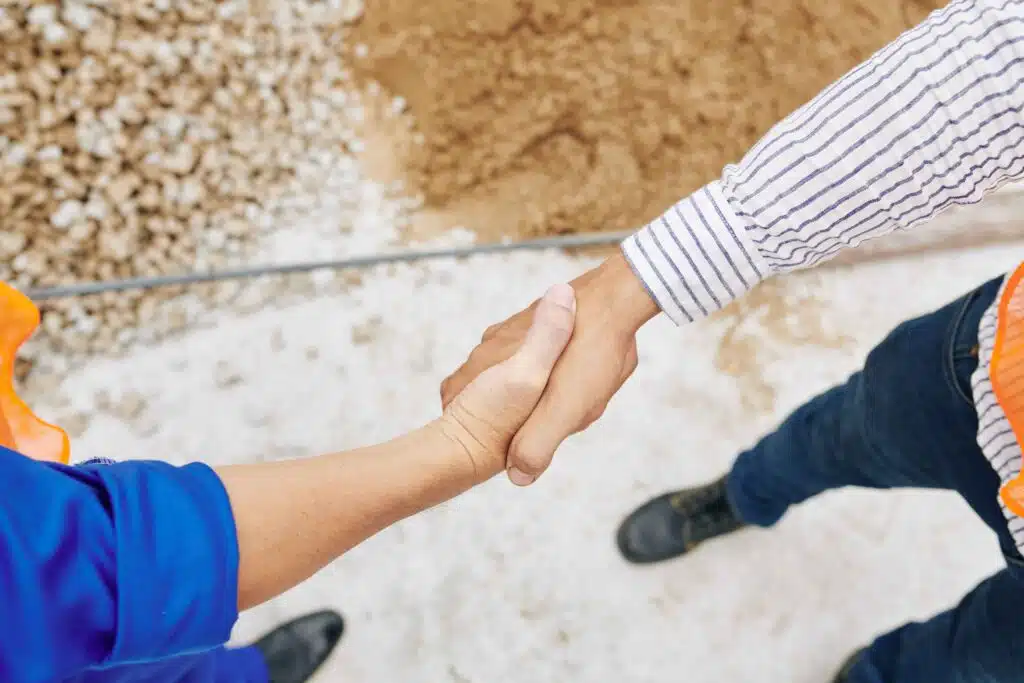contractor-and-builder-shaking-hands-2023-11-27-05-26-40-utc_11zon