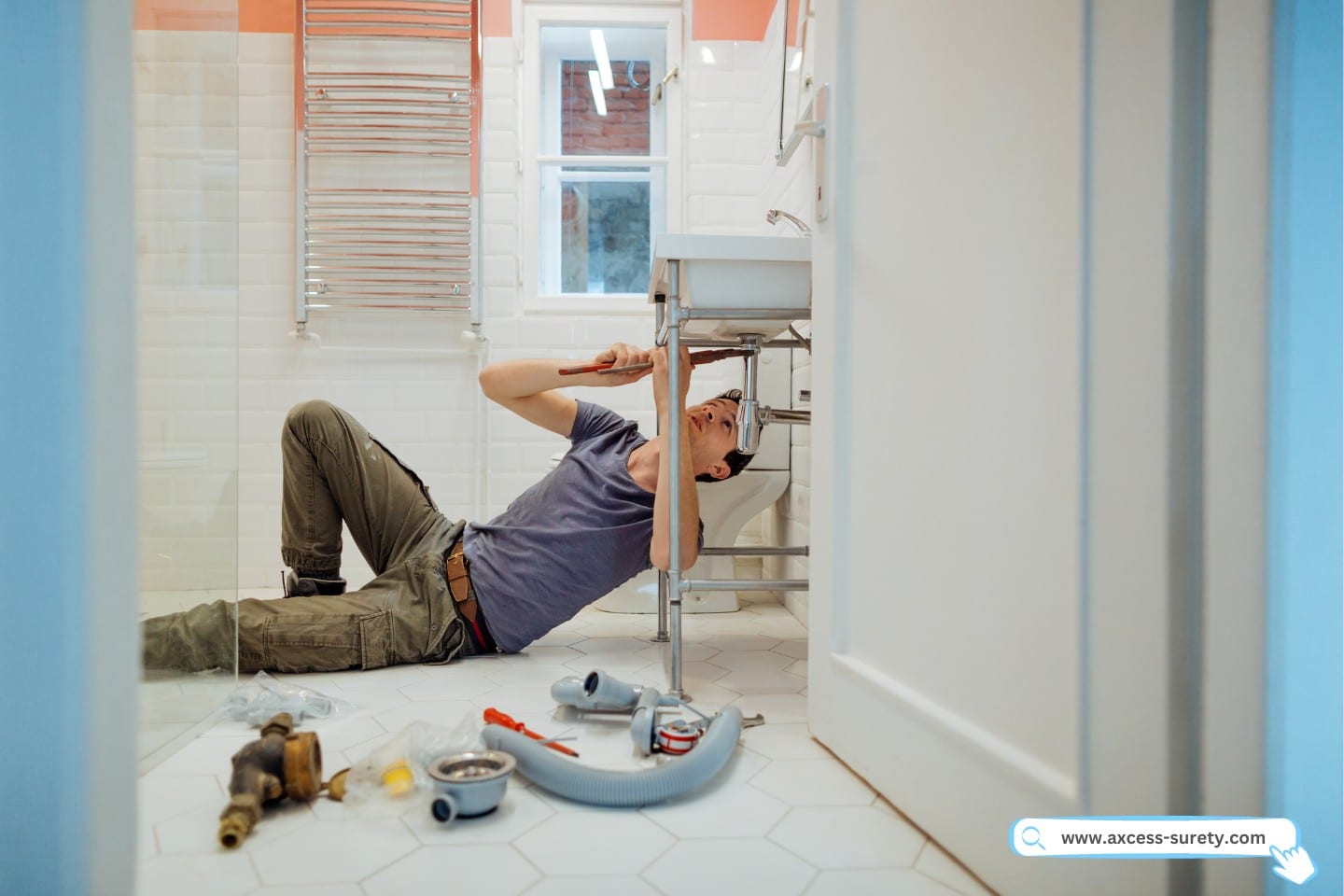 Man solving plumbing problems in the bathroom.