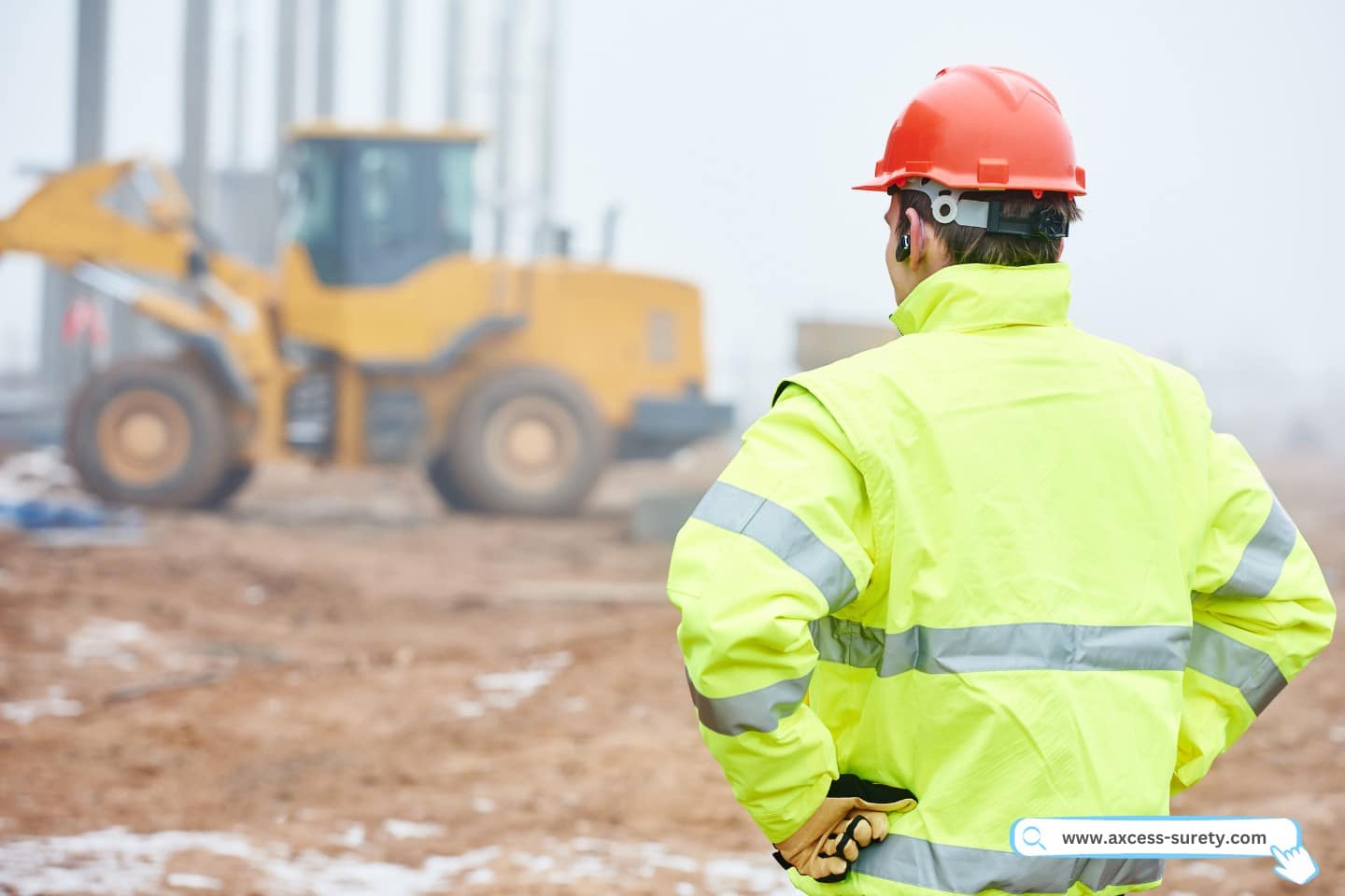 Construction foreman worker is watching building works on site.