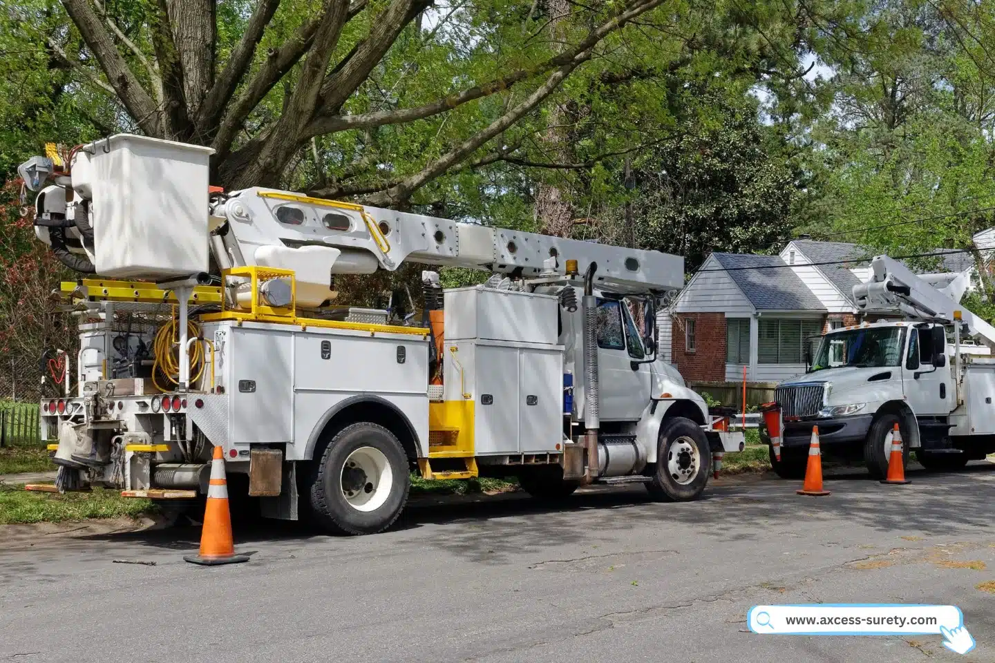 Utility vehicle parked on a neighborhood street in the shade.