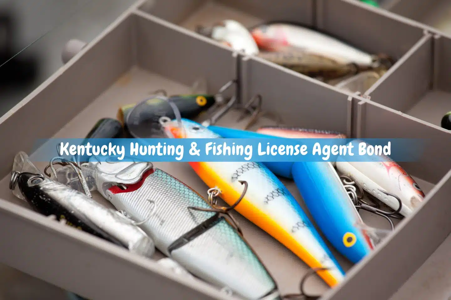 Kentucky Hunting & Fishing License Agent Bond - A box of mixed fishing lures.