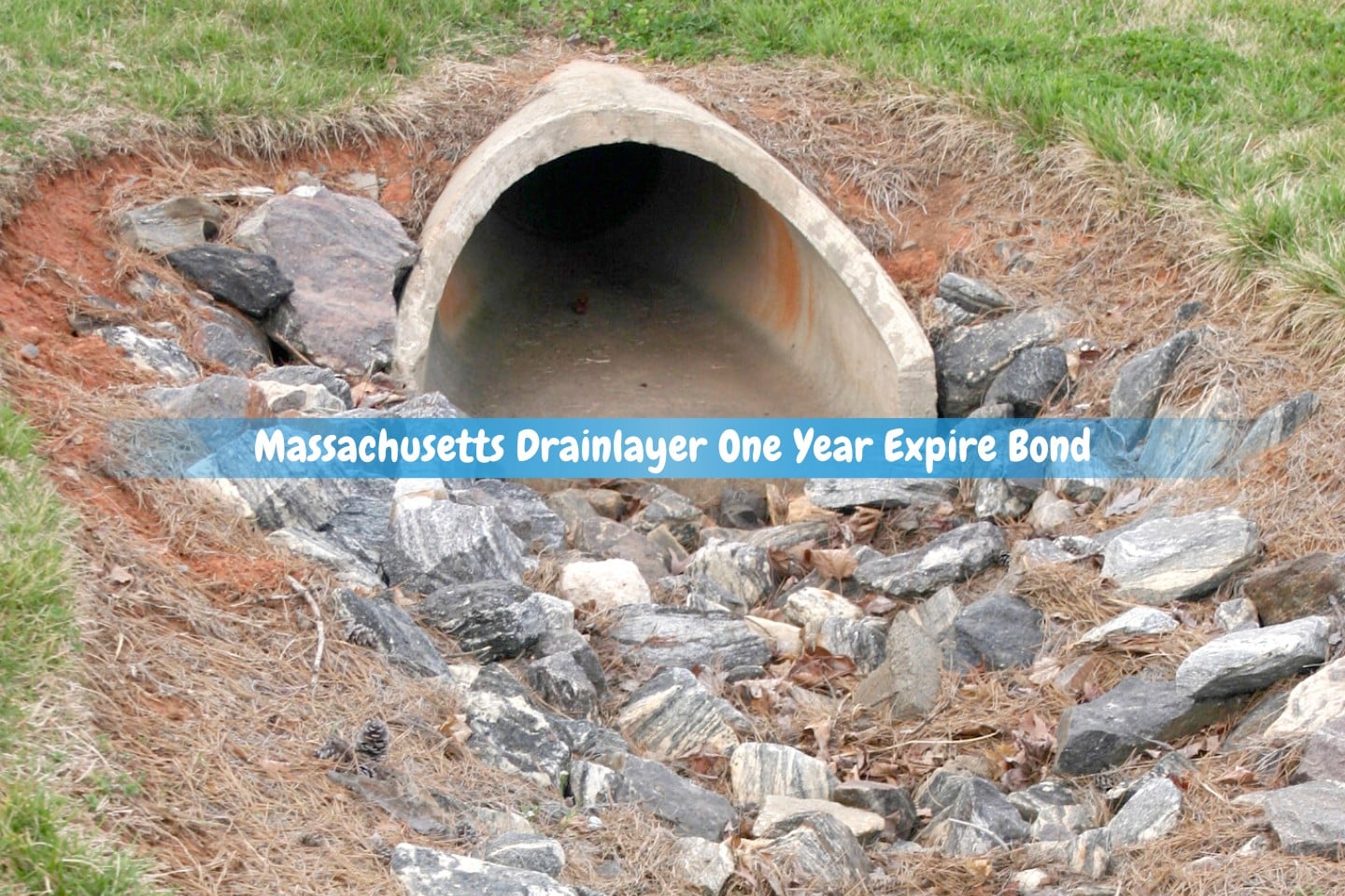 Massachusetts Drainlayer One Year Expire Bond - A damage drain pipes with a rocks around it.