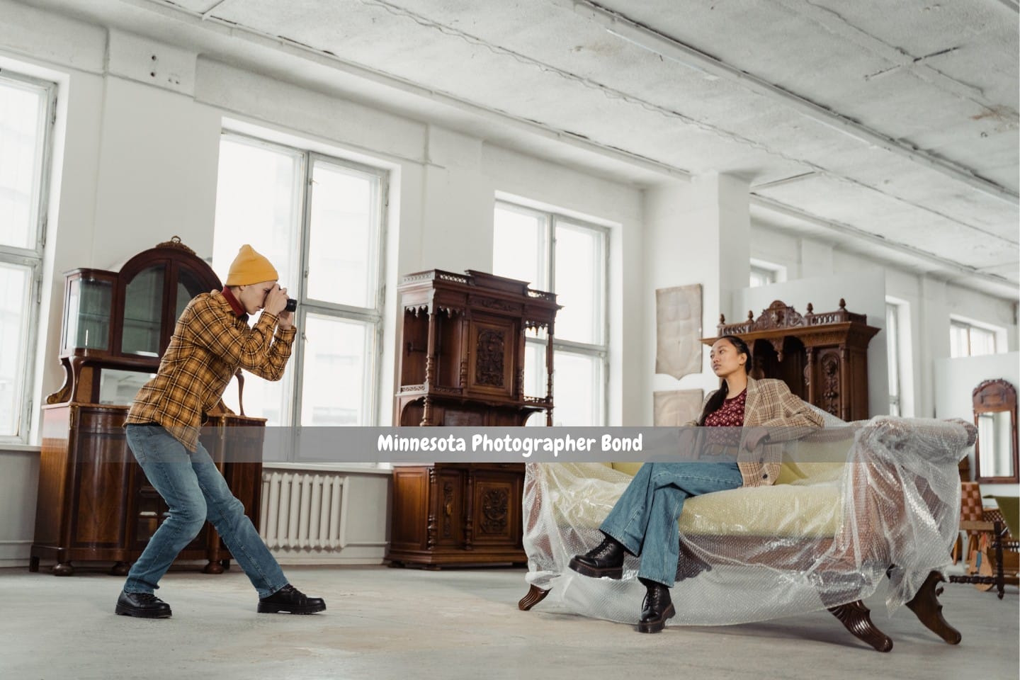 Minnesota Photographer Bond - A model and a photographer are working on a product picture shoot in an antique store.