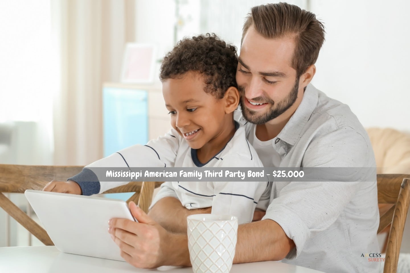 Mississippi American Family Third Party Bond - $25,000 - A joyful father with his adoptive African-American son utilizing a tablet computer at home.