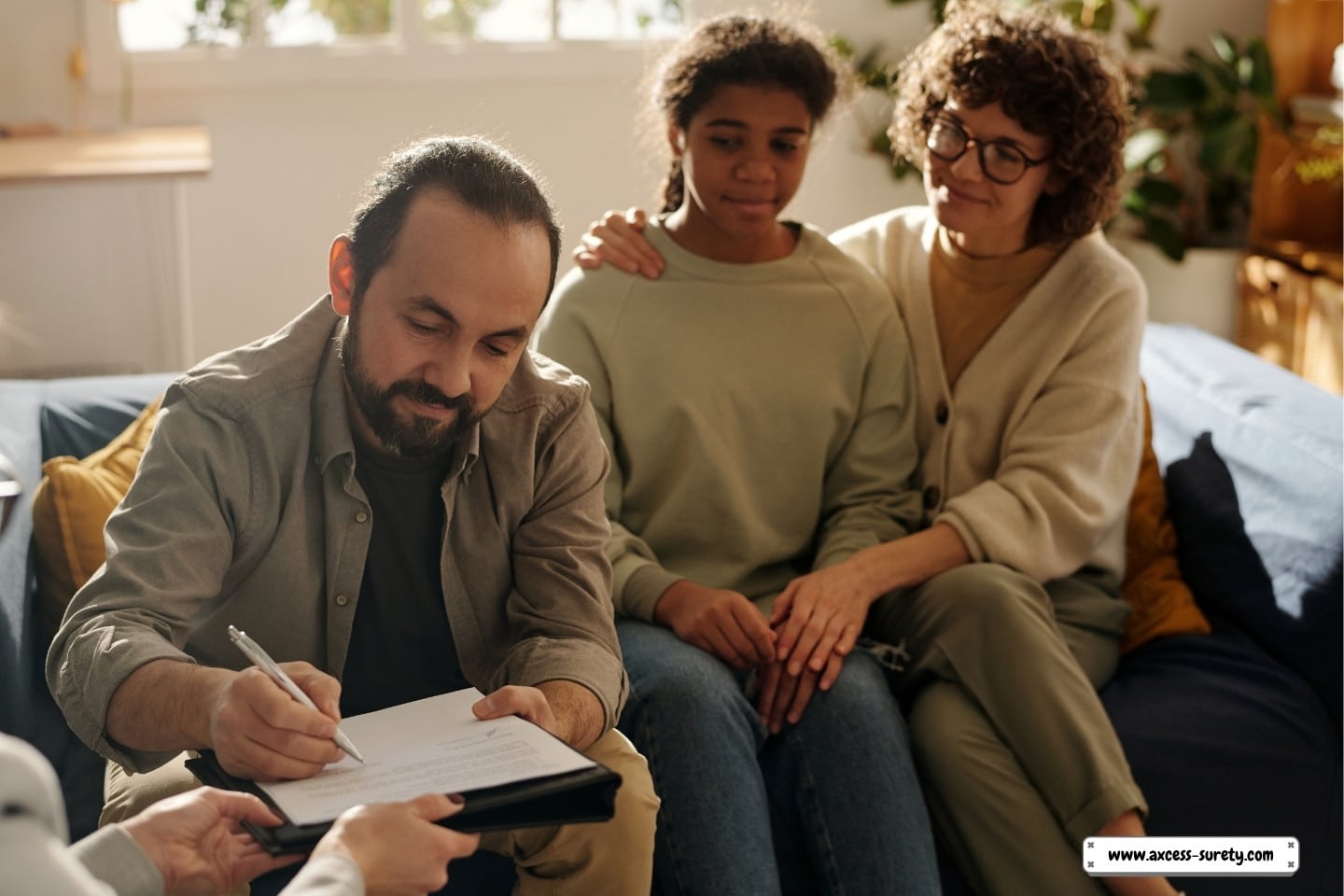 Dad signs custody agreement with social worker.