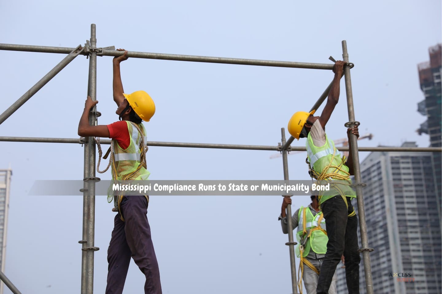 Mississippi Compliance Runs to State or Municipality Bond - On a scaffold are construction workers.