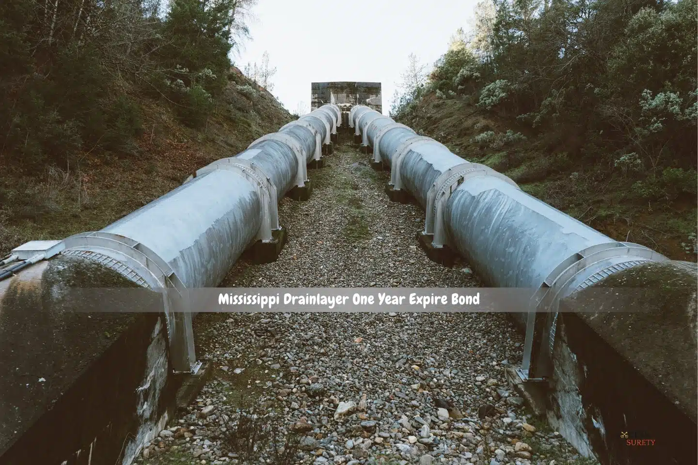 Mississippi Drainlayer One Year Expire Bond - A long drainage pipes in a remote area.