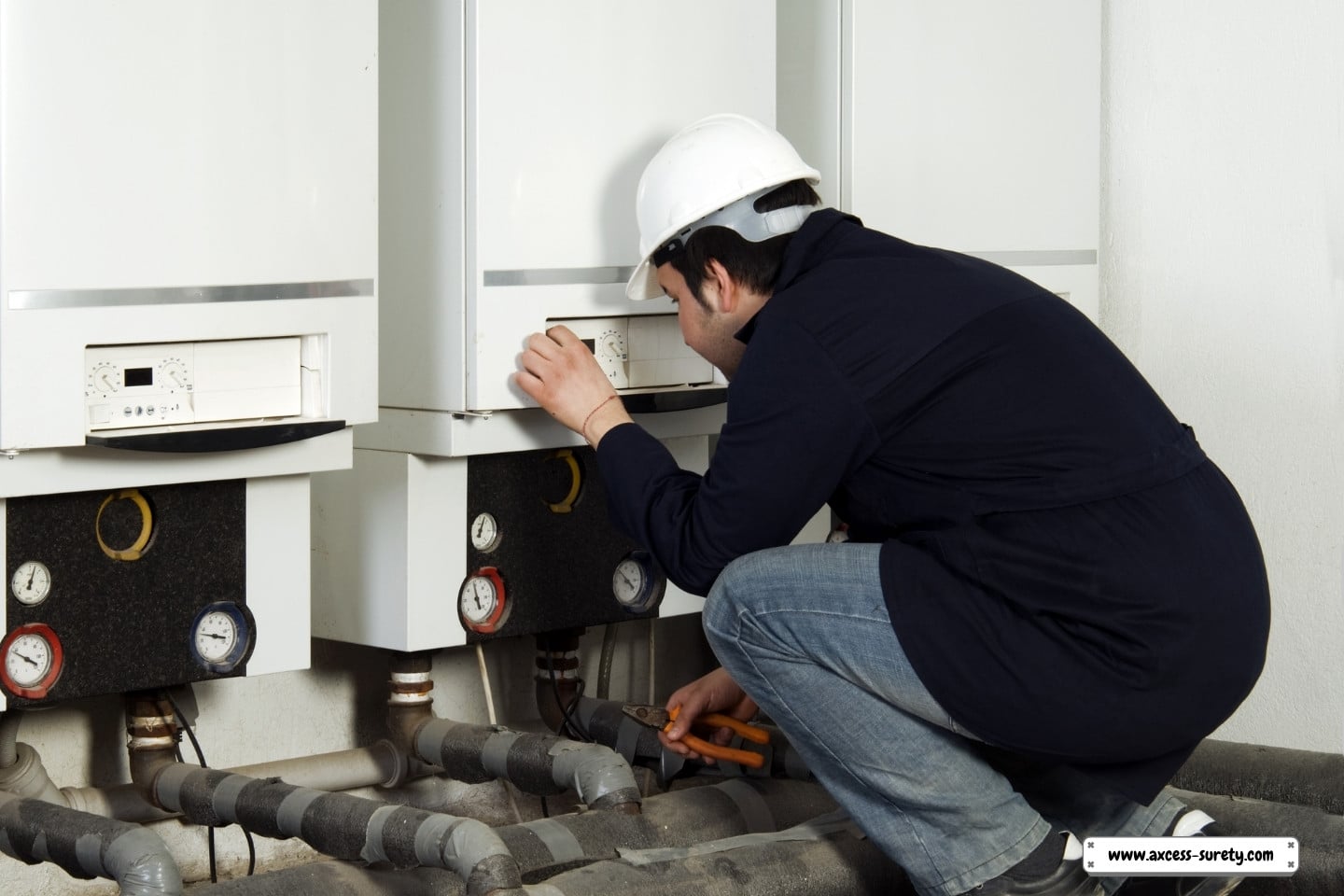When maintenance fitters are in the boiler room, a plumber checks the natural gas.