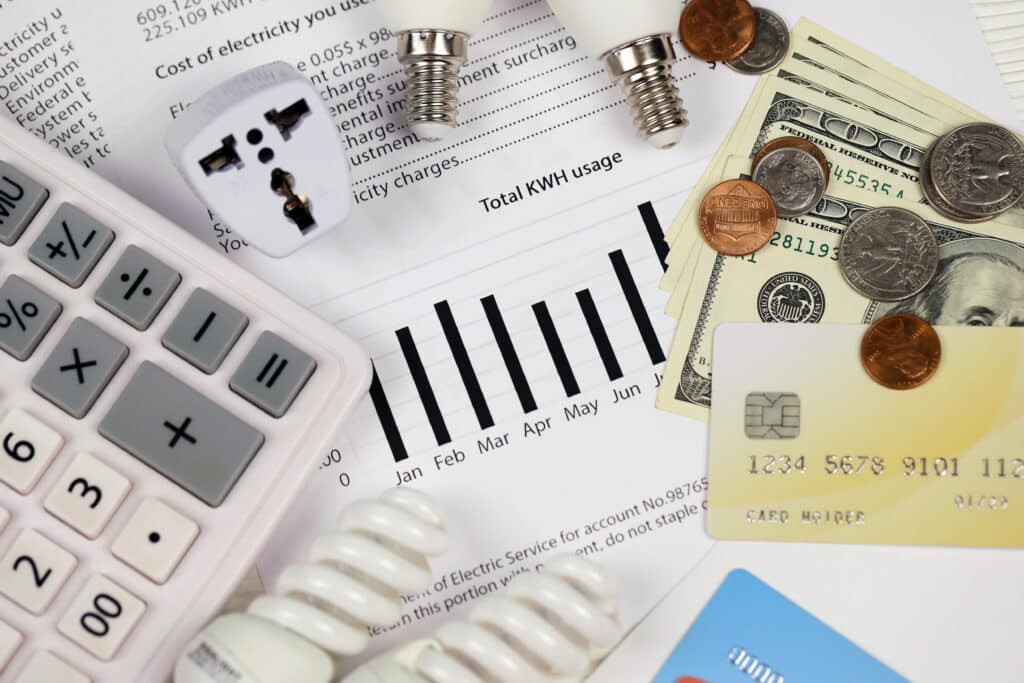 Abstract American electricity bill. Concept of saving money by using energy savings led light bulbs and electric bill payment invoice