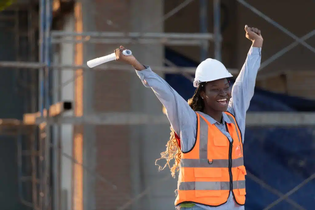 at-the-building-site-a-female-engineer-holds-a-bl-2023-12-16-00-34-49-utc_11zon
