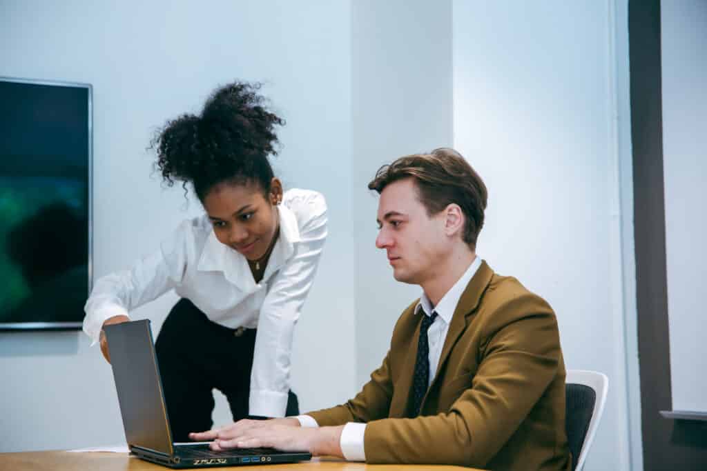 Professional diverse business people having collaboration team meeting in an office, technology and workers, men or employees with touchscreen planning sales, research or financial strategy in company