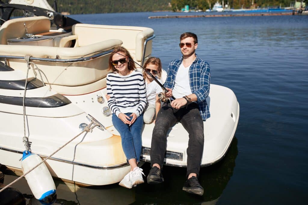 family-with-daughter-fishing-on-yacht-sailboat-on-2024-05-10-21-10-32-utc_11zon
