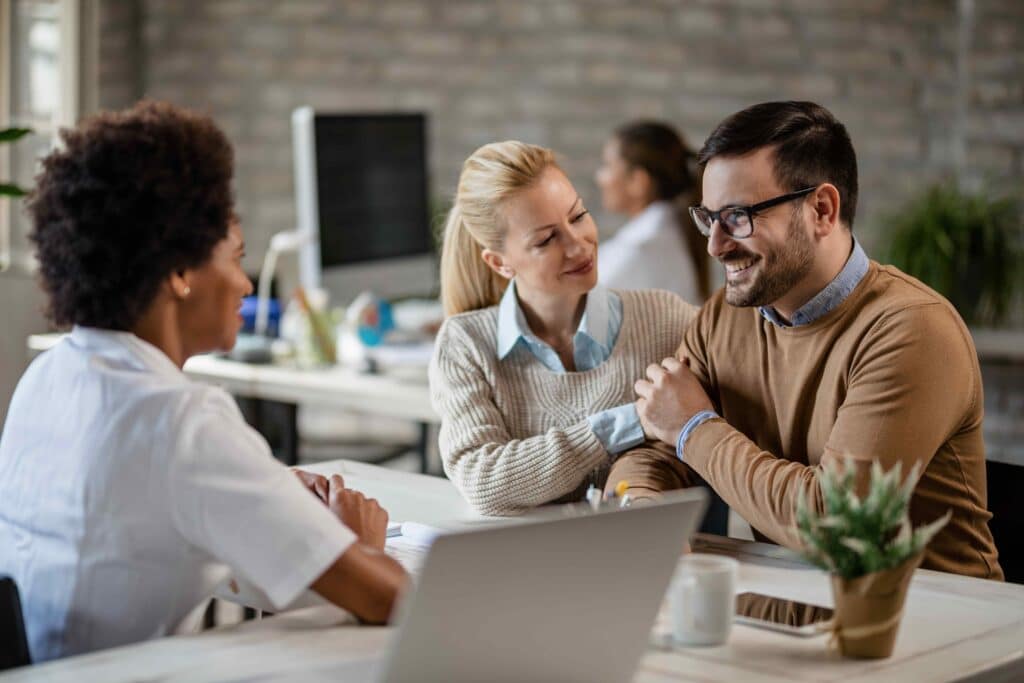 happy-couple-having-consultations-with-a-doctor-at-2023-11-27-05-22-05-utc